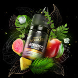 A 30ml bottle of Flavour Beast x Twelve Monkeys vape juice surrounded by mango, pineapple, guava, ice cubes and green leaves. Available at Underground Vapes Woodstock and London.
