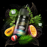 A 30ml bottle of Flavour Beast x Twelve Monkeys vape juice surrounded by lychee, passionfruit, papaya, ice cubes and green leaves. Available at Underground Vapes Woodstock and London.