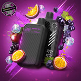 A 20ml disposable vape by Flavour Beast in grape passionfruit iced flavour, surrounded by grapes, passionfruit, and ice cubes. Underground Vapes Woodstock and London