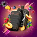 A 20ml disposable vape by Flavour Beast in peach berry, surrounded by peach slices, raspberries, and blueberries. Underground Vapes Woodstock and London