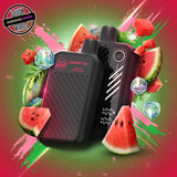 A 20ml disposable vape by Flavour Beast in watermelon iced flavour, surrounded bywatermelon slices and ice cubes. Underground Vapes Woodstock and London
