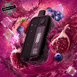 A black disaposable vape by Flavour Beast surrounded by blueberries, raspberries, and pomegranate in water. Underground Vapes Woodstock and London
