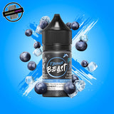 A 30ml bottle of Flavour Beast E-liquid in blueberry ice flavour, surrounded by blueberries and ice cubes, on a bright blue background. Underground Vapes Woodstock and London