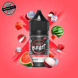 A 30ml bottle of Flavour Beast E-liquid in lychee watermelon ice flavour, surrounded by lychees, watermelon slices, and ice cubes, on a bright pink background. Underground Vapes Woodstock and London