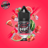 A 30ml bottle of Flavour Beast E-liquid in strawberry watermelon ice flavour, surrounded by strawberries, watermelon slices, and ice cubes, on a bright pink background. Underground Vapes Woodstock and Londo