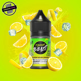 A 30ml bottle of Flavour Beast E-liquid in sour lemon ice flavour, surrounded by lemon slices and ice cubes, on a bright yellow background. Underground Vapes Woodstock and London