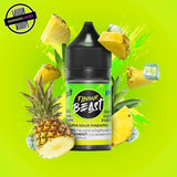 A 30ml bottle of Flavour Beast E-liquid in sour pineapple ice flavour, surrounded by pineapple slices and ice cubes, on a bright yellow-green background. Underground Vapes Woodstock and London