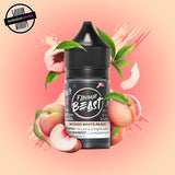 A 30ml bottle of Flavour Beast E-liquid in white peach flavour, surrounded by peach slices, on a pastel peach background. Underground Vapes Woodstock and London