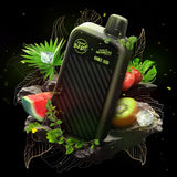 Twelve Monkeys x Beast Mode Max 2 Disposable surrounded bystrawberry, kiwi, watermelon, ice cubes, and green leaves. Available at Underground Vapes Woodstock and London.