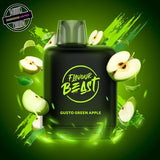 A 20ml prefilled vape pod by Level X Flavour Beast in green apple flavour. The pod is surrounded by green apple slices. Underground Vapes Woodstock and London