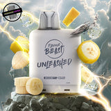 A white 20ml vape pod by Flavour Beast in banana ice flavour. The pod is surrounded by banana slices and ice cubes. Underground Vapes Woodstock and London
