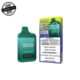 Green STLTH disposable vape in green apple ice flavour with packaging on a white background. Underground Vapes Woodstock and London