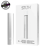 Metallic Silver STLTH USB Type-C stick-style device / battery next to its packaging. Underground Vapes Woodstock and London
